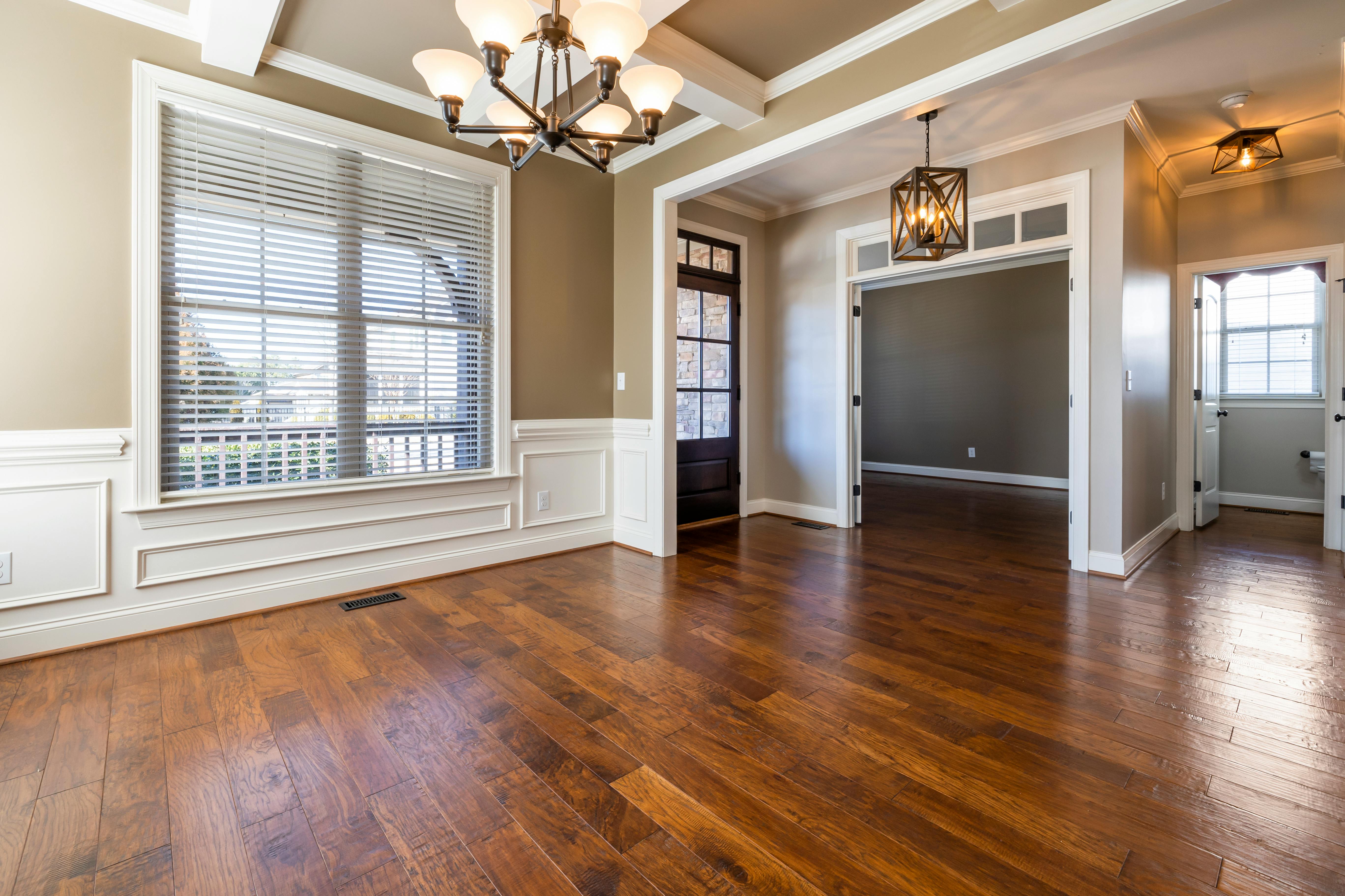 Polished hardwood flooring in an elegant open room